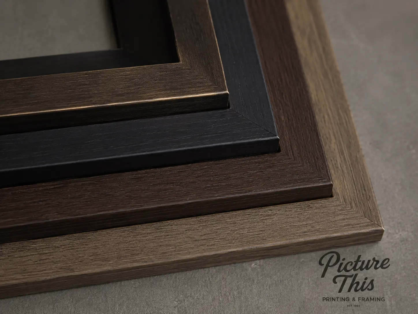 Custom frame finish options showing different moulding profiles and stain colors for art program specifications